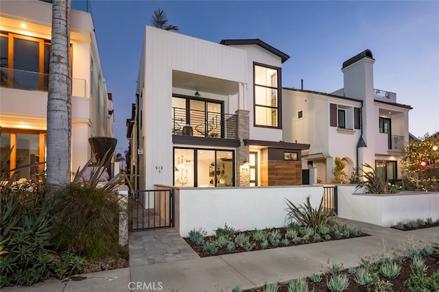 contemporary home featuring a balcony