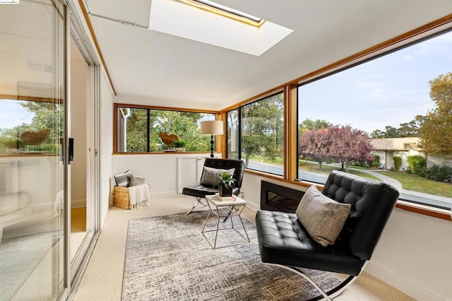 sunroom with a skylight and a wealth of natural light