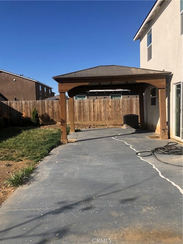 view of parking with a gazebo