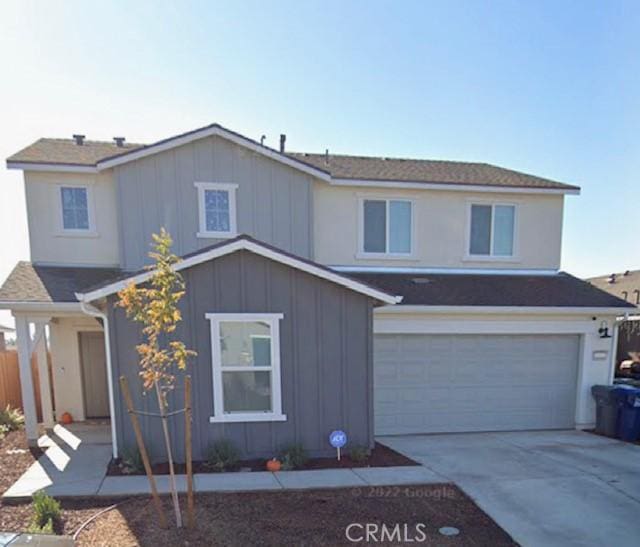 front facade with a garage