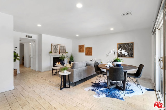 living room with light hardwood / wood-style floors