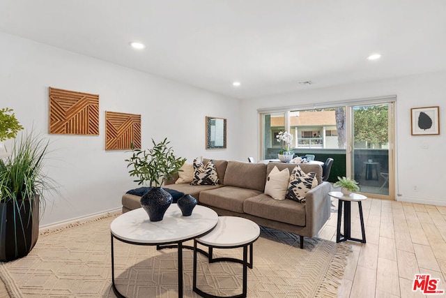 living room with light hardwood / wood-style floors