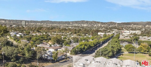 drone / aerial view featuring a mountain view