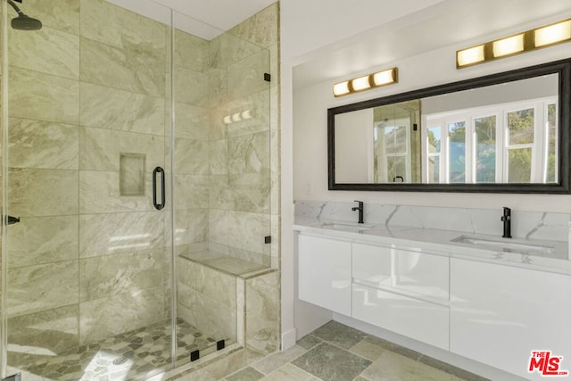 bathroom featuring vanity and walk in shower