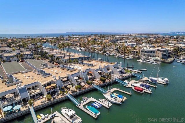 birds eye view of property featuring a water view