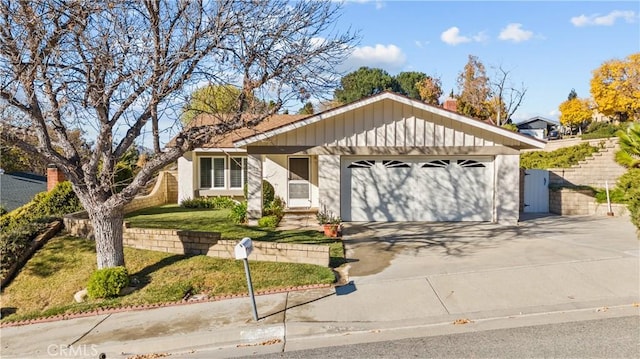 ranch-style home with a garage and a front lawn