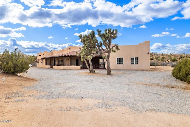 view of adobe home