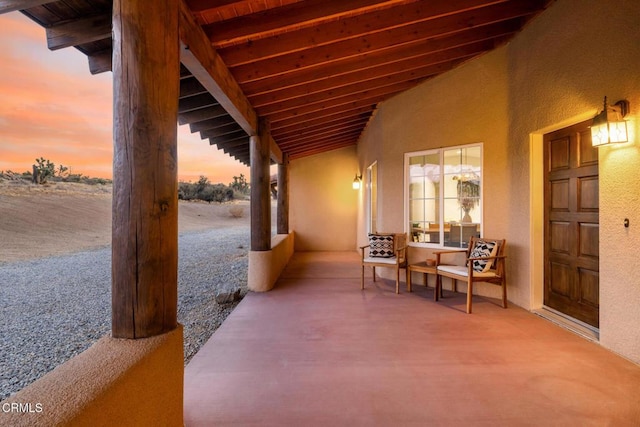 view of patio terrace at dusk