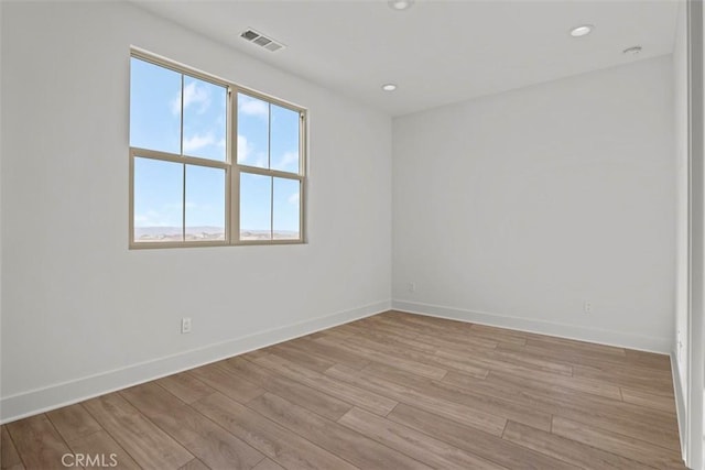 empty room featuring light wood-type flooring