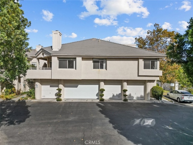 exterior space with a garage