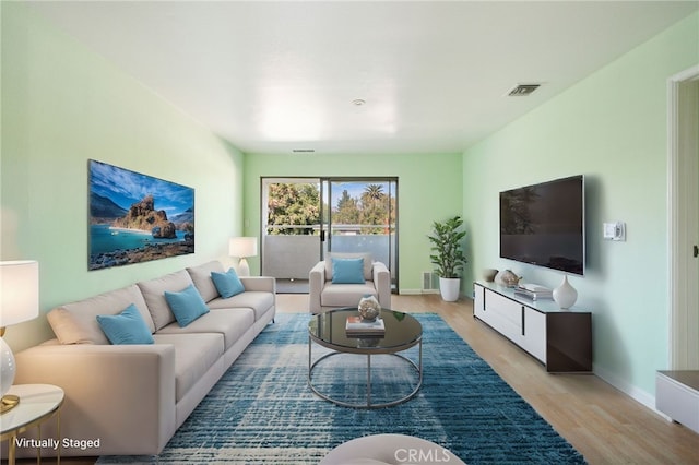 living room with light wood-type flooring