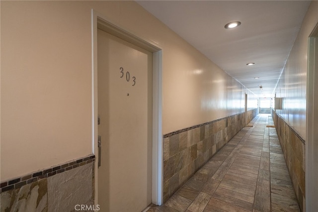 corridor with tile walls