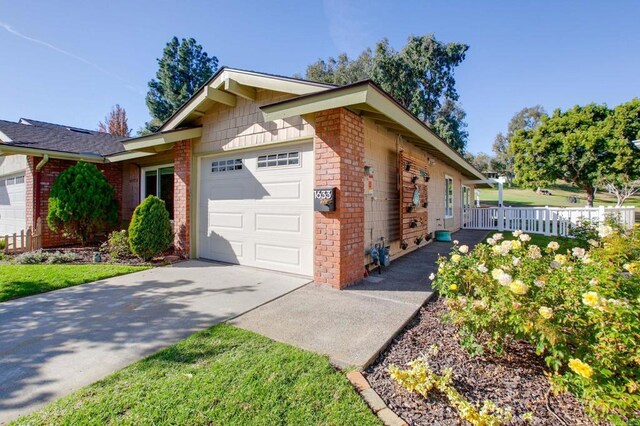 view of side of property featuring a garage