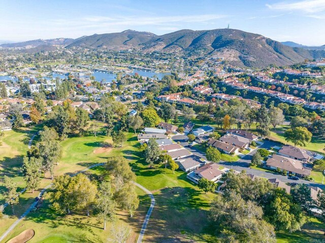 aerial view featuring a water and mountain view