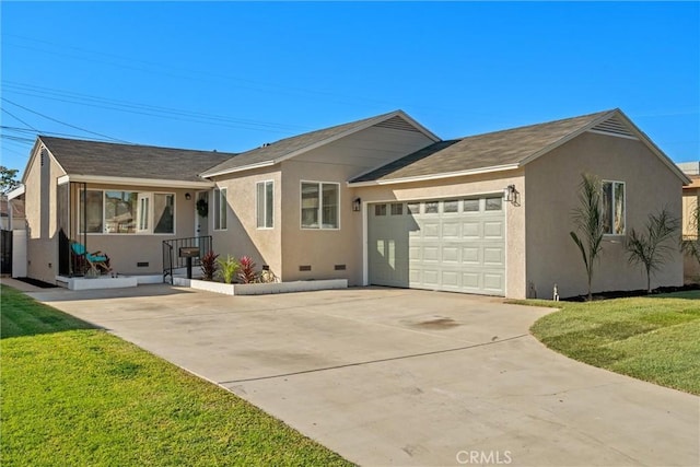 view of front facade with a front lawn and a garage