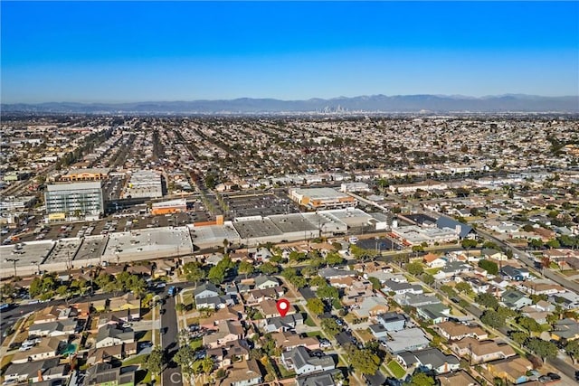 birds eye view of property featuring a mountain view