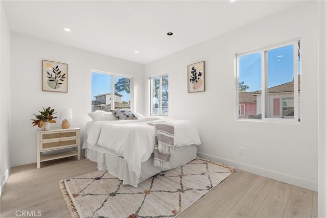 bedroom featuring light wood-type flooring