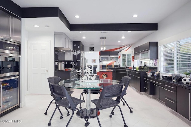 dining area featuring wine cooler