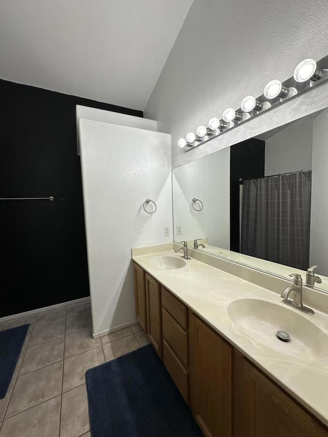 bathroom with vanity and tile patterned floors