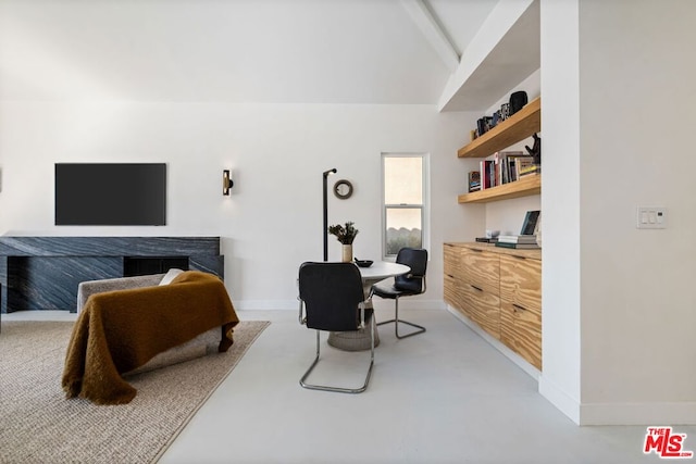 bedroom with lofted ceiling with beams