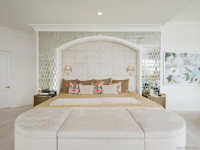 carpeted bedroom with ornamental molding