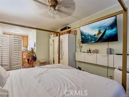 bedroom featuring ceiling fan