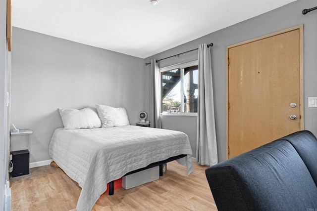 bedroom featuring light wood-type flooring