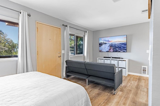 bedroom featuring light hardwood / wood-style flooring