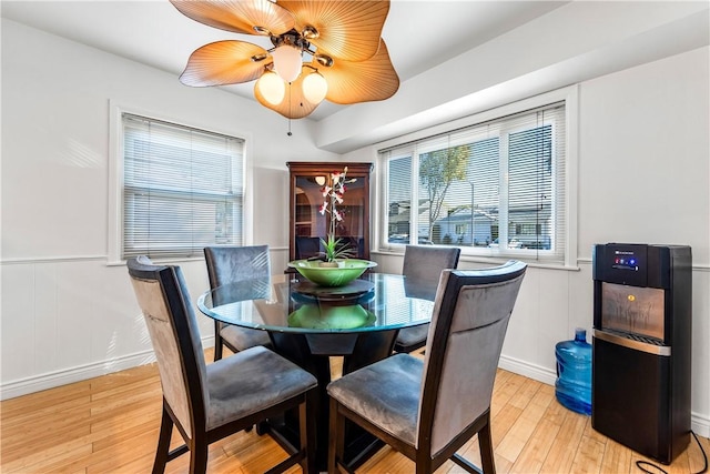 dining area featuring ceiling fan and light hardwood / wood-style flooring