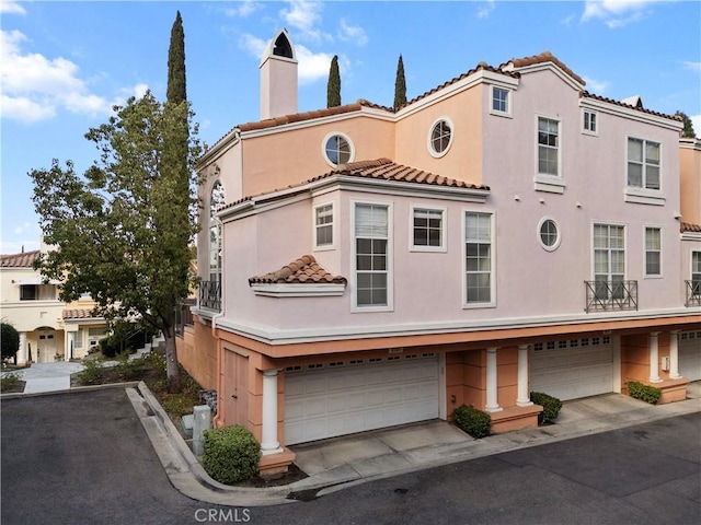 view of front of property featuring a garage