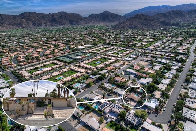 drone / aerial view featuring a mountain view