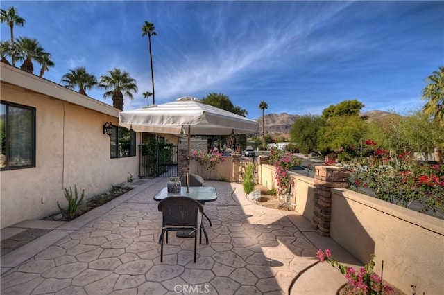 view of patio with a mountain view