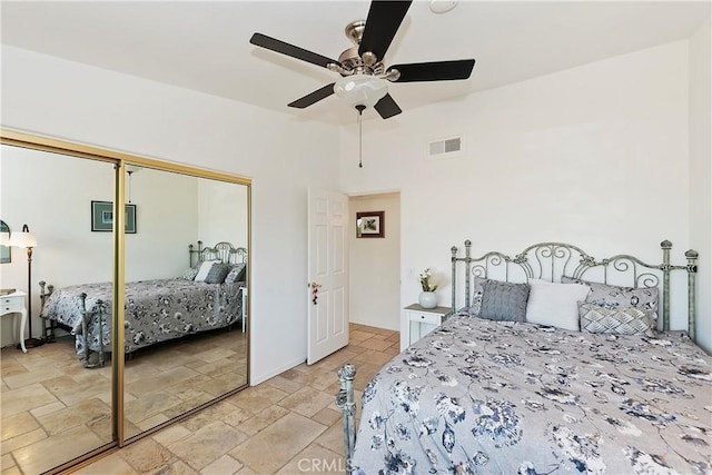 bedroom featuring a closet and ceiling fan