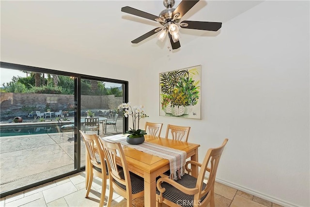 dining space with ceiling fan