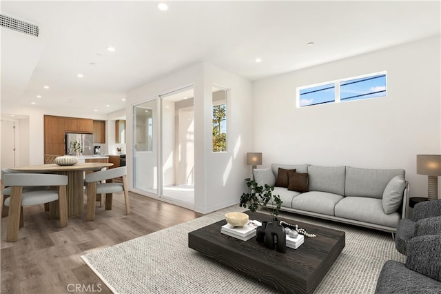 living room with light wood-type flooring