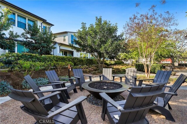 view of patio featuring a fire pit