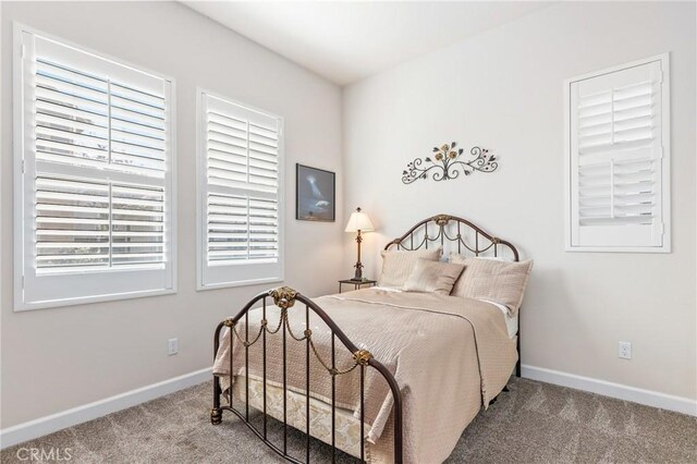 bedroom featuring carpet flooring