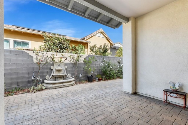 view of patio / terrace with fence