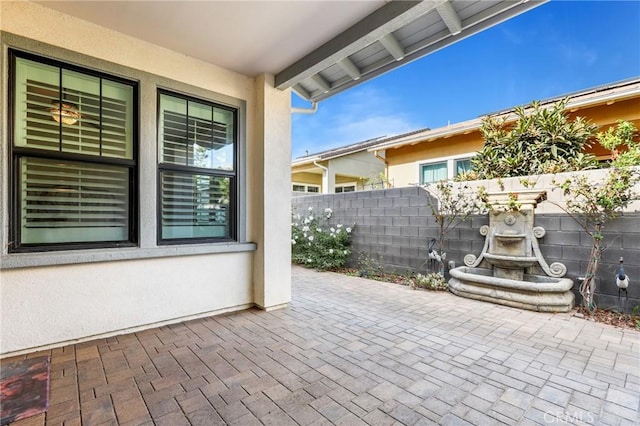 view of patio / terrace with fence