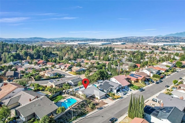 drone / aerial view featuring a mountain view