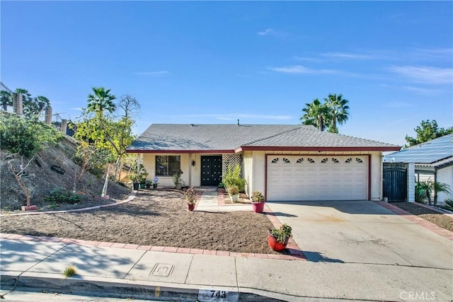 single story home featuring a garage