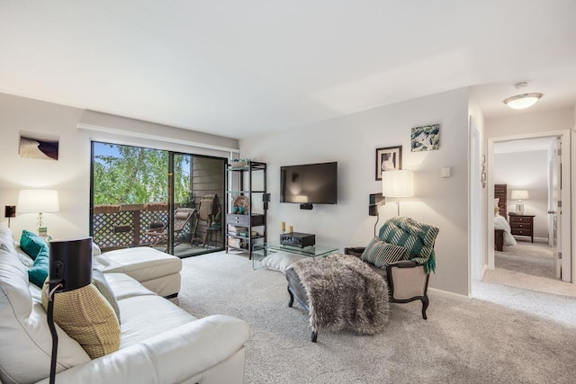 living room featuring light carpet