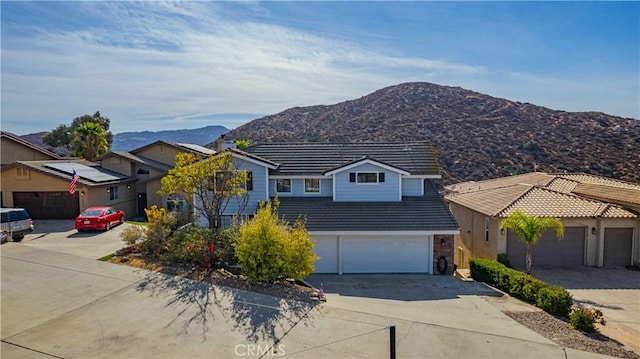 view of front of home featuring a mountain view