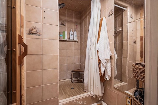 bathroom with a shower with curtain