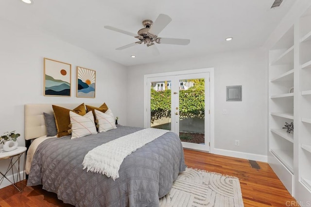 bedroom featuring access to outside, ceiling fan, hardwood / wood-style floors, and french doors