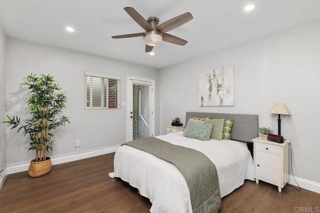 bedroom with ceiling fan, dark hardwood / wood-style floors, and access to outside