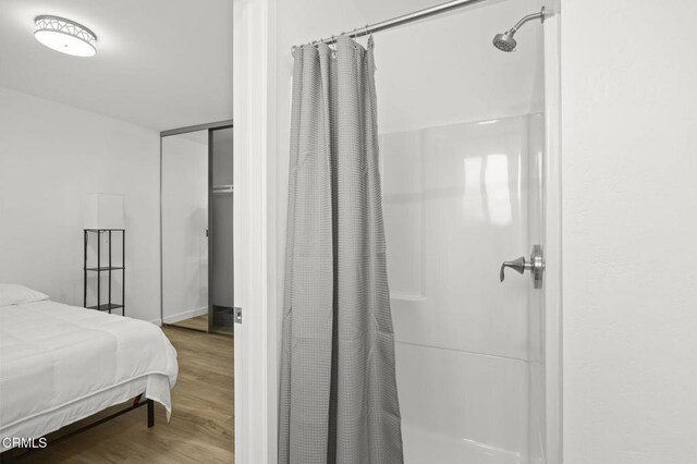 bedroom featuring hardwood / wood-style flooring