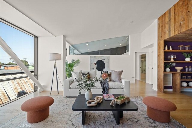 living room with light hardwood / wood-style flooring