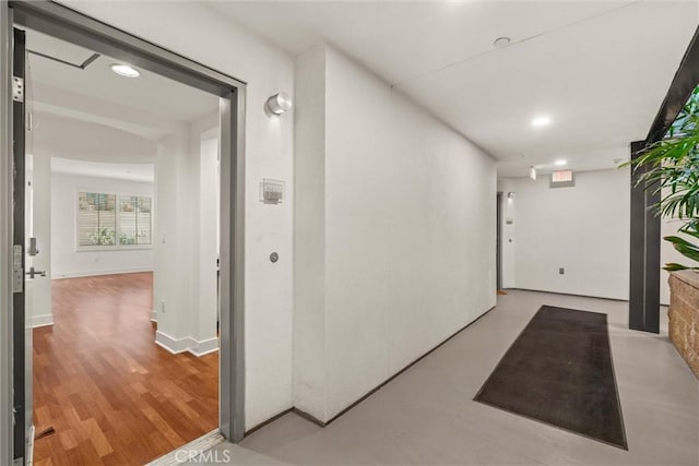 hallway featuring light hardwood / wood-style flooring