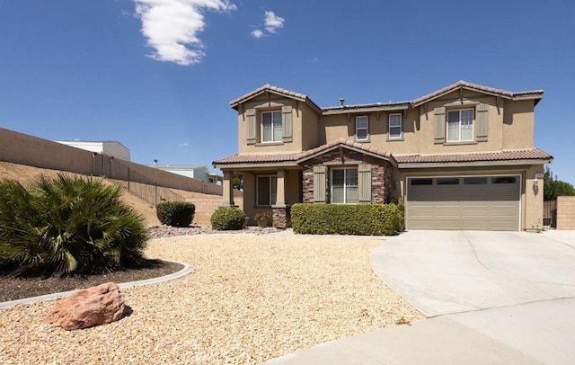 view of front of property featuring a garage